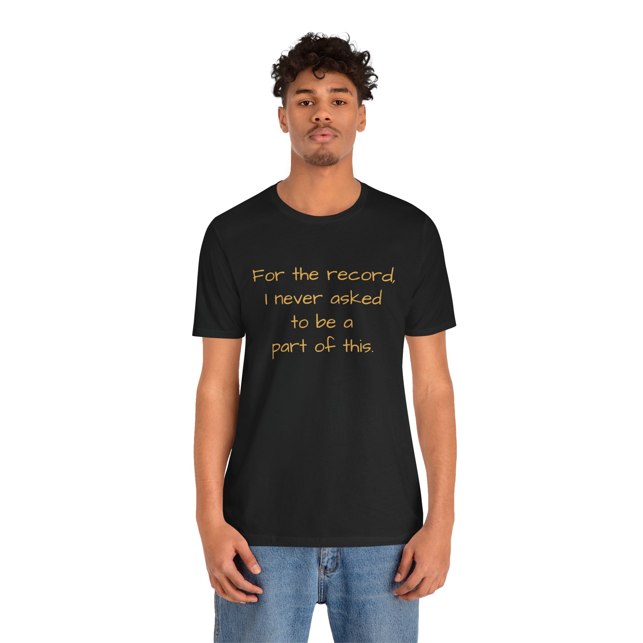 Statement Tee — "For the record, I never asked to be a part of this."